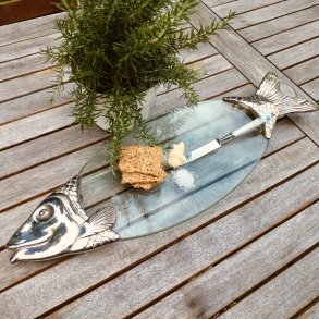 Elegant fiskefad i glas og metal